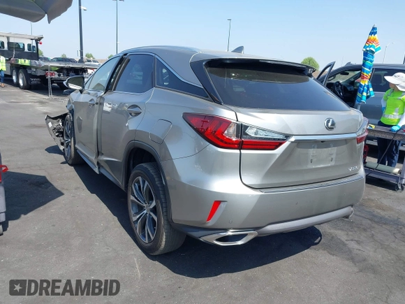 2017 Lexus RX 350 z VIN 2T2ZZMCA3HC041664, wystawiony jako IAAI lot #42379331 z przebiegiem 153 887 mil mil oraz . Historia ofert i sprzedaży dostępna na DreamBid. Obrazek 3.