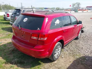 2016 Dodge Journey SE with VIN 3C4PDCAB7GT250093, listed as a IAAI auction lot 42061392 with 100,433 mi miles. Bid and sale history available at carsss.com. Image 4.