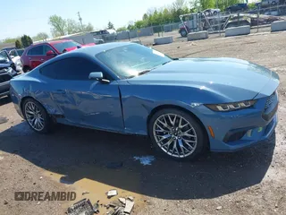 2024 Ford Mustang EcoBoost with VIN 1FA6P8TH8R5140468, listed as a IAAI auction lot 42157511 with 9,559 mi miles and . Bid and sale history available at DreamBid. Image 14.