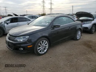 2015 Volkswagen Eos Komfort with VIN WVWBW8AH4FV001321, listed as a Copart auction lot 78718404 with 73,296 mi miles and Salvage Title. Bid and sale history available at DreamBid. Image 1.