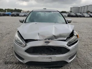 2018 Ford Focus SE with VIN 1FADP3F28JL256318, listed as a Copart auction lot 55524544 with 136,723 mi miles and Salvage title. Bid and sale history available at DreamBid. Image 5.