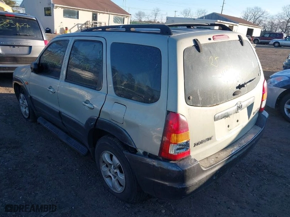 2004 Mazda Tribute LX with VIN 4F2YZ04114KM10120, listed as a IAAI auction lot 41637945 with 999,999 mi miles. Bid and sale history available at carsss.com. Image 3.