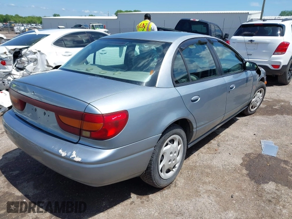 2002 Saturn SL z VIN 1G8ZK52732Z152274, wystawiony jako IAAI lot #42103737 z przebiegiem 56 781 mil mil oraz . Historia ofert i sprzedaży dostępna na DreamBid. Obrazek 4.