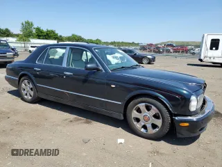 2001 Bentley Arnage with VIN SCBLC31E31CX05992, listed as a Copart auction lot 60462974 with 253,028 mi miles and Salvage Title. Bid and sale history available at DreamBid. Image 4.