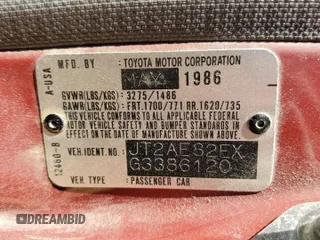 1986 Toyota Corolla with VIN JT2AE82EXG3386120, listed as a Copart auction lot 59397245 with 276,586 mi miles and Salvage title. Bid and sale history available at DreamBid. Image 12.