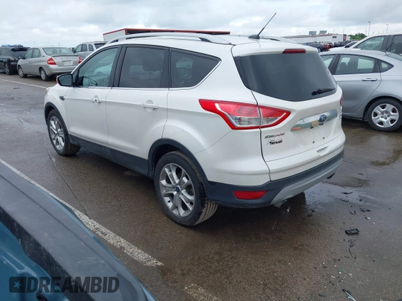 2016 Ford Escape Titanium with VIN 1FMCU9JX4GUB72080, listed as a IAAI auction lot 42519240 with 121,793 mi miles and . Bid and sale history available at DreamBid. Image 3.