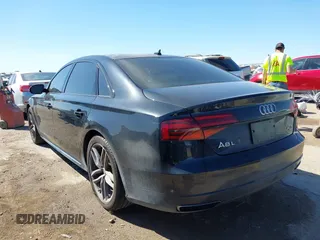 2017 Audi A8 L Sport with VIN WAU43AFD2HN000635, listed as a IAAI auction lot 41686835 with 91,203 mi miles. Bid and sale history available at carsss.com. Image 3.