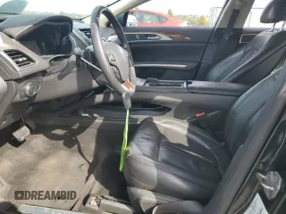 2014 Lincoln MKZ z VIN 3LN6L2GK6ER806741, wystawiony jako Copart lot #57455755 z przebiegiem 96 849 mil mil oraz Szkoda całkowita • Salvage title. Historia ofert i sprzedaży dostępna na DreamBid. Obrazek 7.