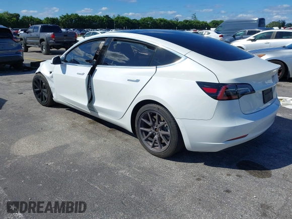 2020 Tesla Model 3 Standard Range Plus with VIN 5YJ3E1EA8LF783631, listed as a IAAI auction lot 40696383 with 78,889 mi miles. Bid and sale history available at carsss.com. Image 3.