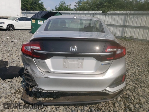 2018 Honda Clarity with VIN JHMZC5F14JC017054, listed as a Copart auction lot 65295514 with 74,498 mi miles and Salvage title. Bid and sale history available at DreamBid. Image 6.