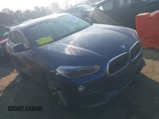 2018 BMW X2 sDrive28i with VIN WBXYJ3C36JEP75885, listed as a IAAI auction lot 41503551 with 136,671 mi miles. Bid and sale history available at carsss.com. Image 1.