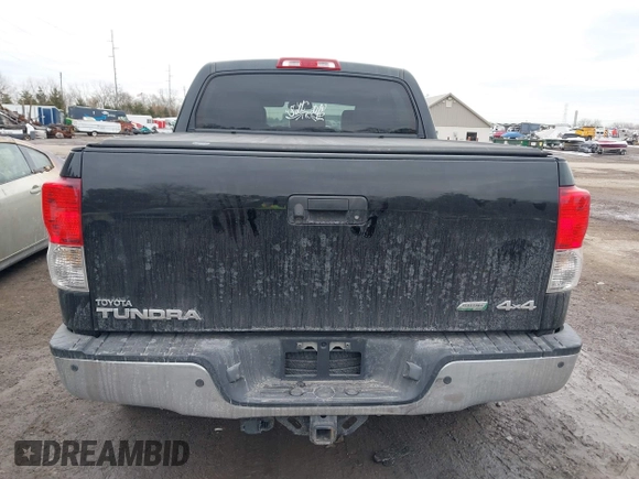 2012 Toyota Tundra 4WD Truck LTD with VIN 5TFHW5F19CX218772, listed as a IAAI auction lot 41472955 with 134,928 mi miles. Bid and sale history available at carsss.com. Image 16.
