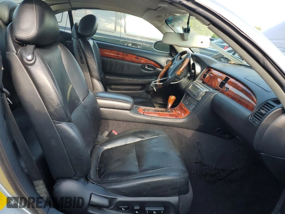 2002 Lexus SC 430 with VIN JTHFN48Y420018791, listed as a Copart auction lot 61790145 with 130,872 mi miles and Salvage title. Bid and sale history available at DreamBid. Image 7.