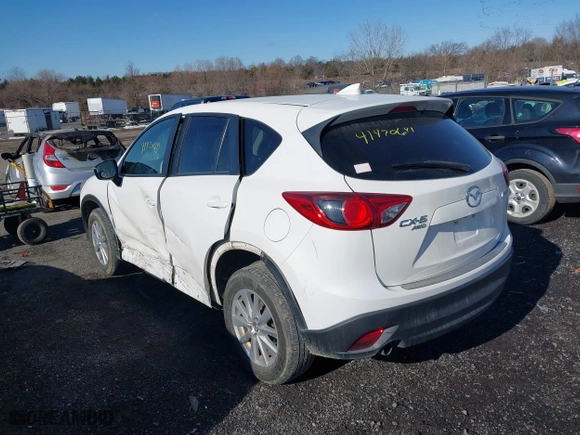 2016 Mazda CX-5 Touring with VIN JM3KE4CYXG0917841, listed as a IAAI auction lot 41420641 with 75,710 mi miles. Bid and sale history available at carsss.com. Image 3.