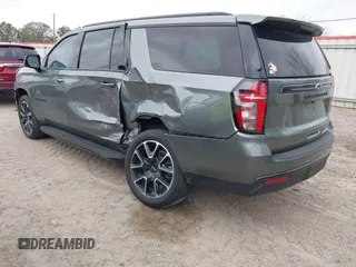 2024 Chevrolet Suburban RST with VIN 1GNSCEKD0RR277471, listed as a IAAI auction lot 41278023 with 2 mi miles and . Bid and sale history available at DreamBid. Image 3.