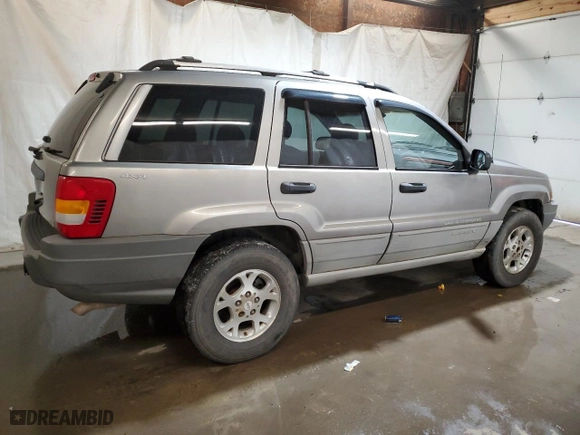 1999 Jeep Grand Cherokee Laredo with VIN 1J4GW58N0XC686845, listed as a Copart auction lot 48877805 with 155,908 mi miles and Clean Title. Bid and sale history available at carsss.com. Image 3.