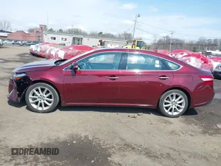 2014 Toyota Avalon Limited with VIN 4T1BK1EB1EU134577, listed as a IAAI auction lot 41994918 with 74,570 mi miles. Bid and sale history available at carsss.com. Image 14.