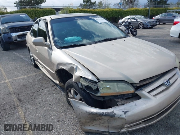 2001 Honda Accord EX z VIN 1HGCG66821A084618, wystawiony jako IAAI lot #41959020 z przebiegiem 272 671 mil mil oraz . Historia ofert i sprzedaży dostępna na DreamBid. Obrazek 6.