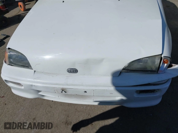 1992 Geo Metro z VIN JG1MR3364NK213871, wystawiony jako IAAI lot #41719350 z przebiegiem 22 589 mil mil oraz . Historia ofert i sprzedaży dostępna na DreamBid. Obrazek 6.
