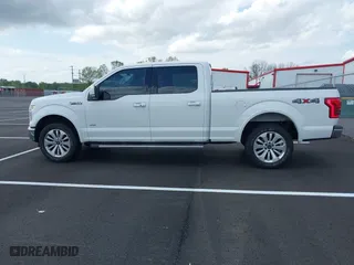 2015 Ford F-150 XLT w/HD Payload Pkg with VIN 1FTFW1EGXFFB88326, listed as a IAAI auction lot 41972016 with 204,767 mi miles. Bid and sale history available at carsss.com. Image 14.