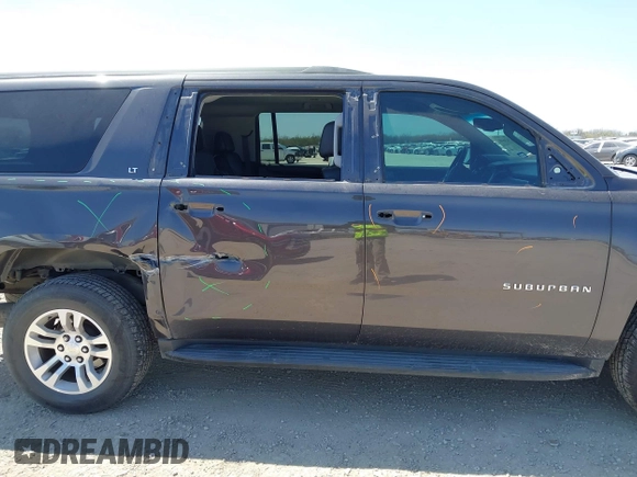 2016 Chevrolet Suburban LT z VIN 1GNSCHKC3GR313126, wystawiony jako IAAI lot #41743640 z przebiegiem 178 351 mil mil oraz . Historia ofert i sprzedaży dostępna na DreamBid. Obrazek 14.