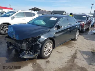 2015 Toyota Avalon Hybrid XLE Touring with VIN 4T1BD1EBXFU038040, listed as a IAAI auction lot 41203276 with 142,014 mi miles. Bid and sale history available at carsss.com. Image 18.