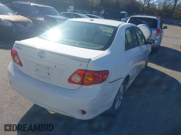 2009 Toyota Corolla with VIN 1NXBU40E59Z070160, listed as a IAAI auction lot 41887778 with 185,133 mi miles. Bid and sale history available at carsss.com. Image 4.