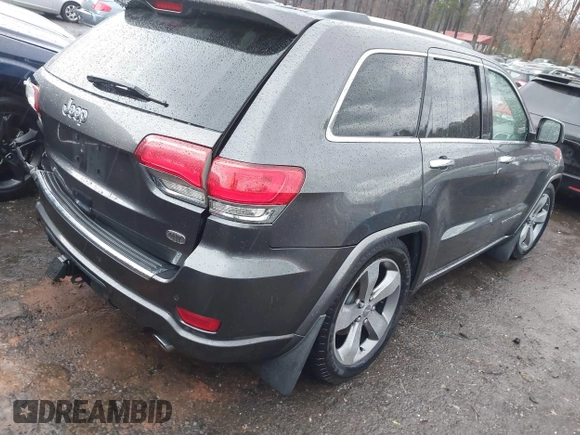 2014 Jeep Grand Cherokee Overland with VIN 1C4RJFCT2EC146239, listed as a IAAI auction lot 41368514 with 164,239 mi miles. Bid and sale history available at carsss.com. Image 4.