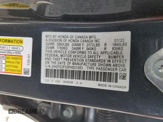 2023 Honda Civic Sport with VIN 2HGFE2F53PH521053, listed as a Copart auction lot 57096835 with 55,800 mi miles and Salvage title. Bid and sale history available at DreamBid. Image 12.