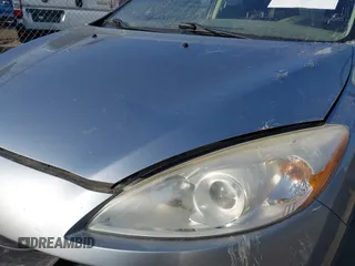 2012 Mazda 5 Sport with VIN JM1CW2BL1C0115788, listed as a IAAI auction lot 41770484 with 154,182 mi miles. Bid and sale history available at carsss.com. Image 6.