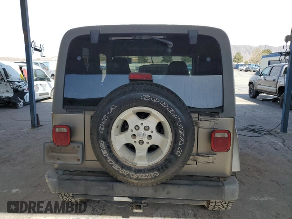 2003 Jeep Wrangler Sahara with VIN 1J4FA59S83P303347, listed as a Copart auction lot 51811755 with 145,640 mi miles and Clean title. Bid and sale history available at DreamBid. Image 6.