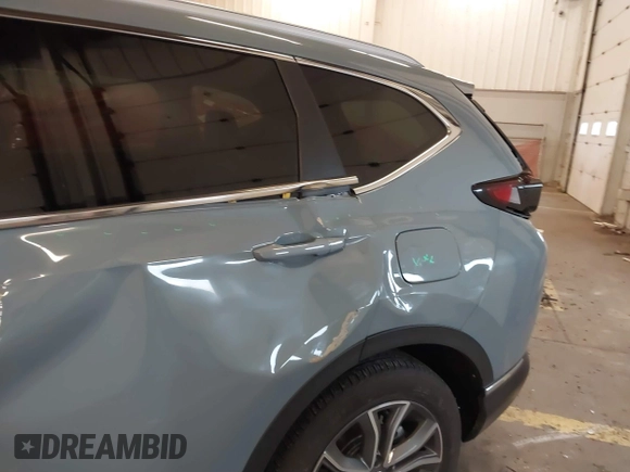 2022 Honda CR-V Touring with VIN 2HKRW2H94NH629730, listed as a IAAI auction lot 41677074 with 34,006 mi miles. Bid and sale history available at carsss.com. Image 17.