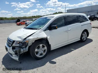 2013 Honda Odyssey Touring with VIN 5FNRL5H92DB064031, listed as a Copart auction lot 53559395 with 170,967 mi miles and Clean Title. Bid and sale history available at carsss.com. Image 1.