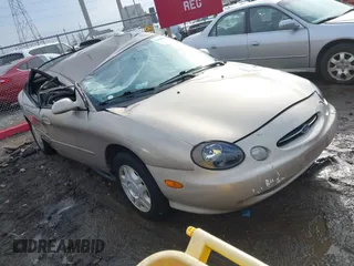 1999 Ford Taurus SE with VIN 1FAFP53U3XA131984, listed as a IAAI auction lot 41638566 with 84,836 mi miles. Bid and sale history available at carsss.com. Image 1.