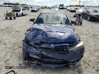 2018 BMW M3 z VIN WBS8M9C59J5J79848, wystawiony jako Copart lot #57026165 z przebiegiem Nie podano mil oraz Szkoda całkowita • Salvage title. Historia ofert i sprzedaży dostępna na DreamBid. Obrazek 5.