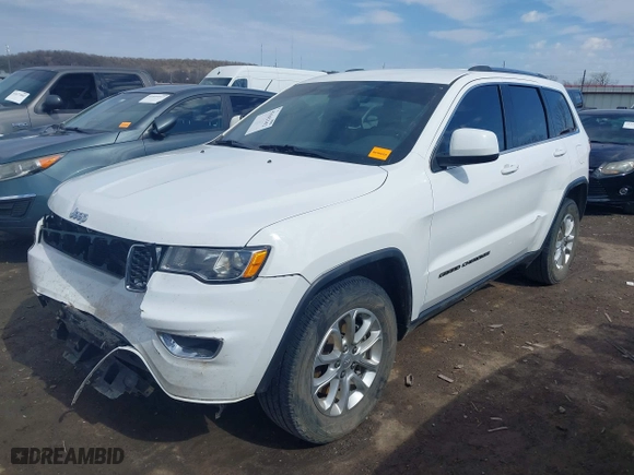2021 Jeep Grand Cherokee Laredo X with VIN 1C4RJEAG2MC605574, listed as a IAAI auction lot 41642362 with 104,066 mi miles. Bid and sale history available at carsss.com. Image 18.