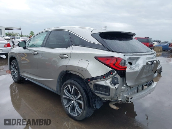 2020 Lexus RX with VIN 2T2HZMAA9LC178535, listed as a IAAI auction lot 41920764 with 119,377 mi miles. Bid and sale history available at carsss.com. Image 3.