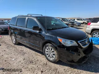 2012 Volkswagen Routan SE with VIN 2C4RVABG0CR146143, listed as a Copart auction lot 50765305 with 127,969 mi miles and Salvage Title. Bid and sale history available at carsss.com. Image 4.