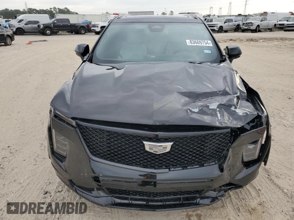 2024 Cadillac XT4 FWD Sport with VIN 1GYFZER46RF213543, listed as a Copart auction lot 83609754 with 3,878 mi miles and Salvage title. Bid and sale history available at DreamBid. Image 5.
