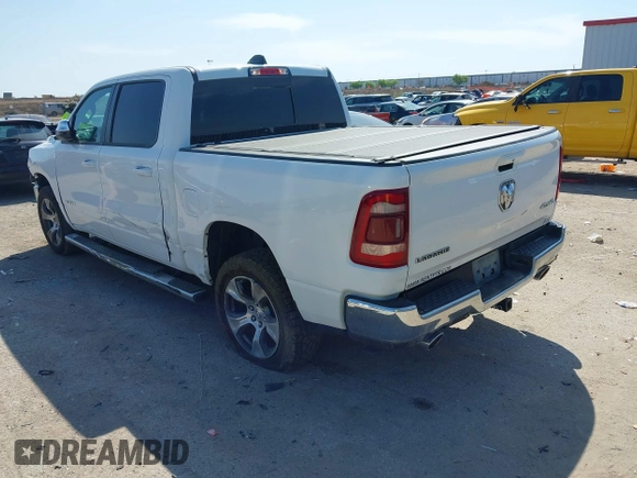 2023 Ram 1500 Laramie with VIN 1C6SRFJT0PN508550, listed as a IAAI auction lot 41913849 with 57,765 mi miles and . Bid and sale history available at DreamBid. Image 3.