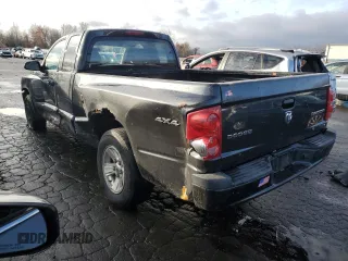 2011 Dodge Dakota z VIN 1D7RW2BK3BS602758, wystawiony jako Copart lot #85288074 z przebiegiem 138 473 mil mil oraz Szkoda całkowita • Salvage title. Historia ofert i sprzedaży dostępna na DreamBid. Obrazek 2.