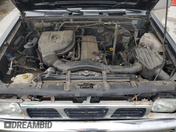 1994 Nissan Frontier XE z VIN 1N6SD16S3RC305688, wystawiony jako Copart lot #54371715 z przebiegiem 207 543 mil mil oraz Szkoda całkowita • Salvage title. Historia ofert i sprzedaży dostępna na DreamBid. Obrazek 11.