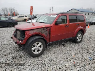 2009 Dodge Nitro SXT with VIN 1D8GU28K69W522292, listed as a Copart auction lot 84890274 with 121,311 mi miles and Salvage Title. Bid and sale history available at carsss.com. Image 1.