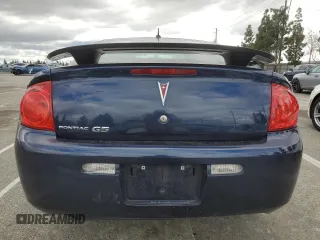 2009 Pontiac G5 with VIN 1G2AS18H997204531, listed as a Copart auction lot 48634655 with 73,936 mi miles and Salvage Title. Bid and sale history available at DreamBid. Image 6.