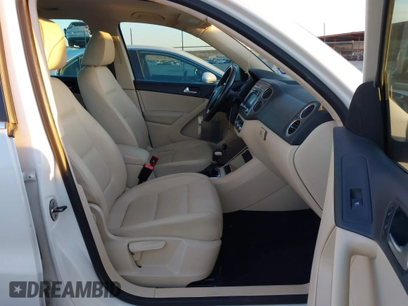2010 Volkswagen Tiguan SEL with VIN WVGBV7AX4AW514362, listed as a IAAI auction lot 41413300 with 154,201 mi miles and . Bid and sale history available at DreamBid. Image 5.