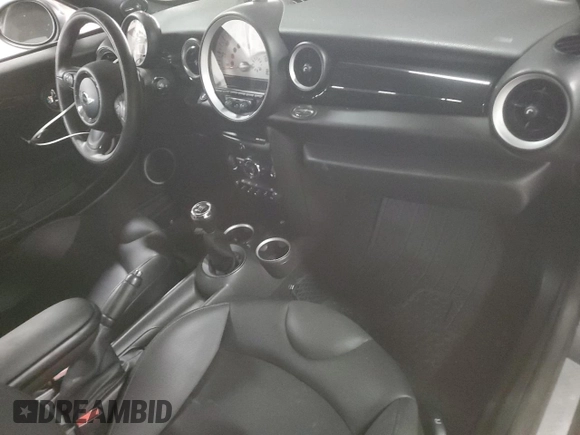 2012 MINI Coupe S z VIN WMWSX3C51CT408195, wystawiony jako Copart lot #77008744 z przebiegiem Nie podano mil oraz Szkody całkowita. Historia ofert i sprzedaży dostępna na DreamBid. Obrazek 8.