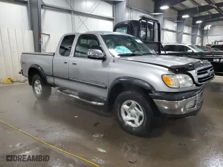 2002 Toyota Tundra SR5 with VIN 5TBBT44162S289386, listed as a Copart auction lot 45793015 with 128,659 mi miles and Salvage Title. Bid and sale history available at carsss.com. Image 4.