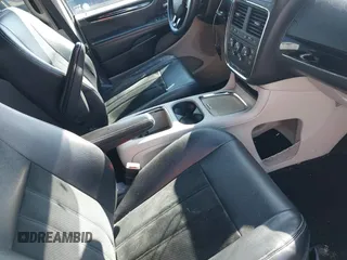 2014 Dodge Grand Caravan SXT with VIN 2C4RDGCG3ER339491, listed as a IAAI auction lot 41744826 with 146,757 mi miles and . Bid and sale history available at DreamBid. Image 5.