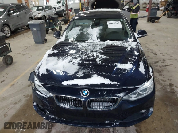 2015 BMW 4 Series 428i xDrive with VIN WBA4A7C57FD414955, listed as a IAAI auction lot 41609214 with 69,125 mi miles and . Bid and sale history available at DreamBid. Image 12.