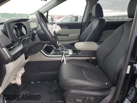 2024 Kia Carnival LX with VIN KNDNB4H39R6303228, listed as a Copart auction lot 78284124 with 8,738 mi miles and Salvage Title. Bid and sale history available at carsss.com. Image 7.